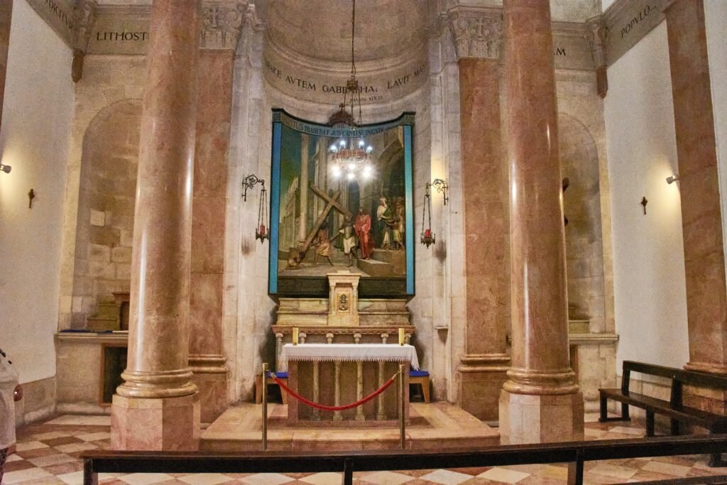 a church with a painting on the wall